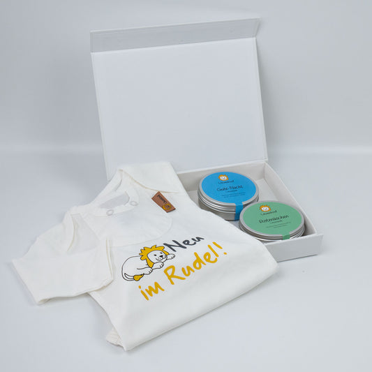 Geschenkset mit Geschenkbox, bedrucktem Body "Neu im Rudel" und zwei Kräuterpad-Dosen